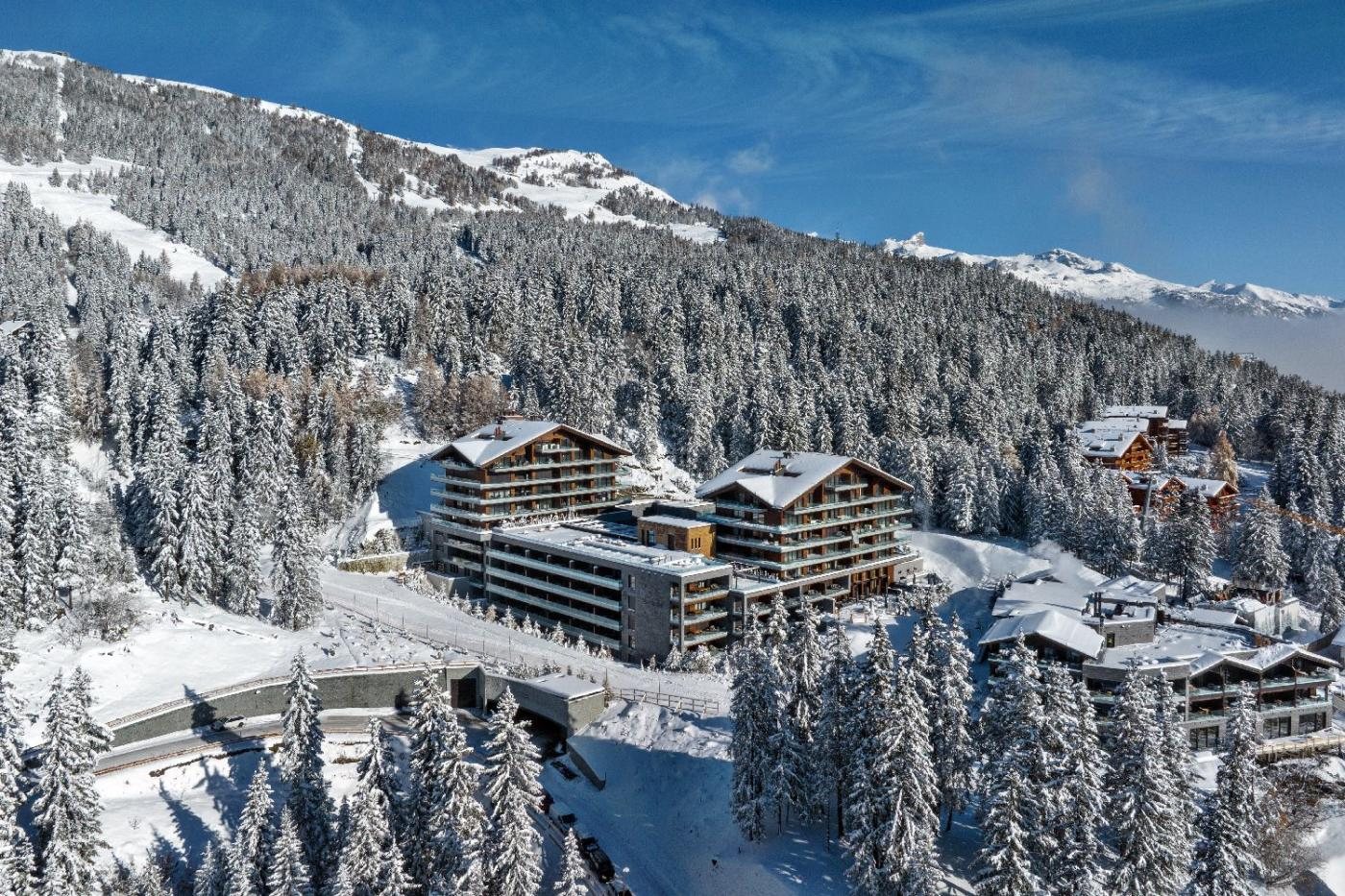 Six Senses Crans Montana Swiss Alps quiet luxury season hotel