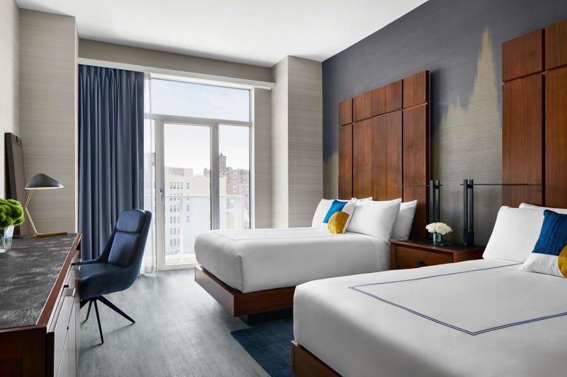 Deluxe Balcony Room at Gansevoort Meatpacking NYC with step-out balcony