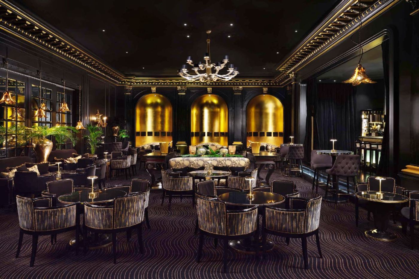 American Bar at The Savoy London with polished seating and grand cocktail-bar atmosphere