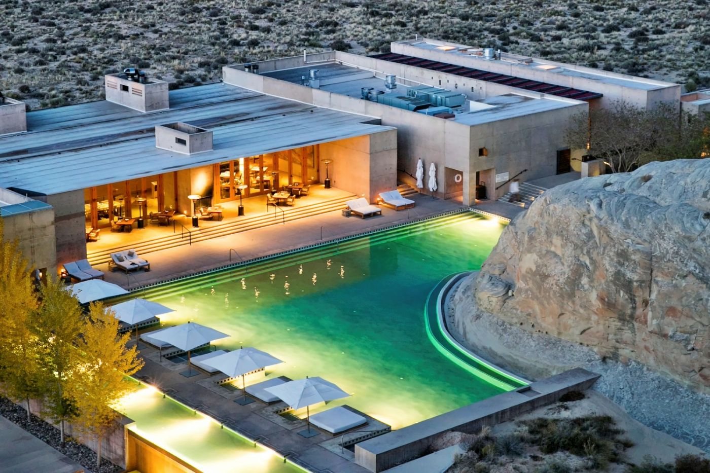 Amangiri swimming pool wrapped around desert rock in Utah