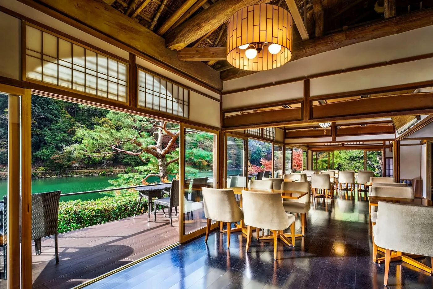 Traditional Japanese dining room at Suiran Kyoto overlooking a garden