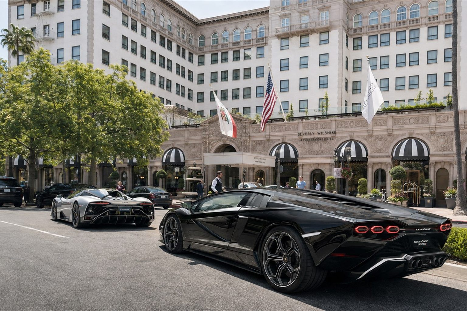 Lamborghini and Mercedes-AMG outside Beverly Wilshire in daylight