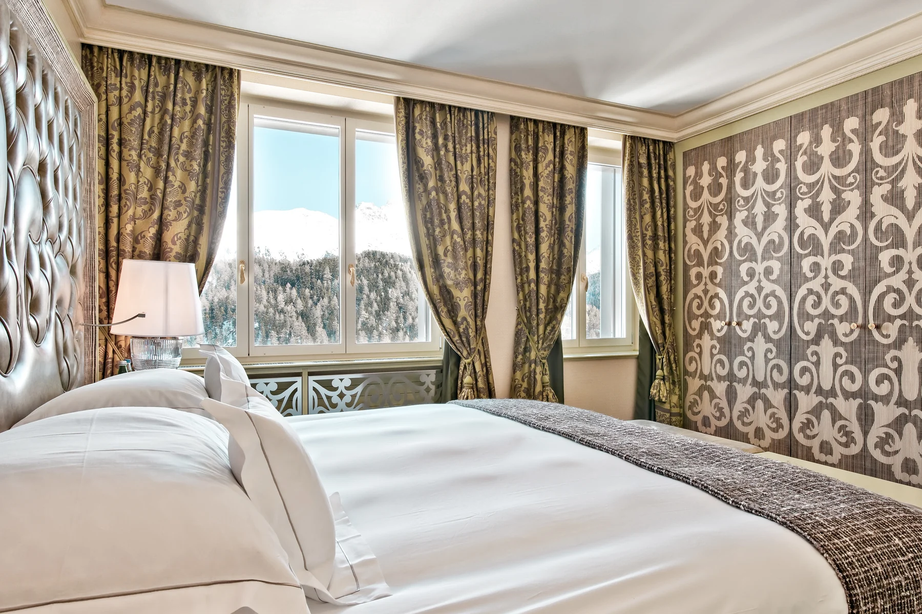 Carlton Hotel St. Moritz suite bedroom with mountain views