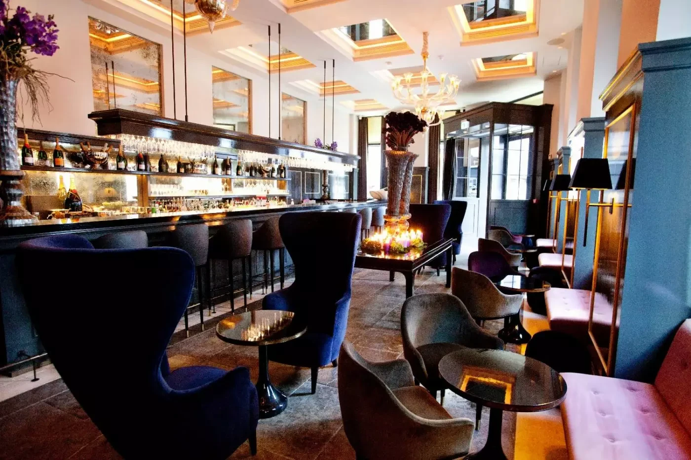 Bar seating and fireplace at Hotel d'Angleterre in Copenhagen