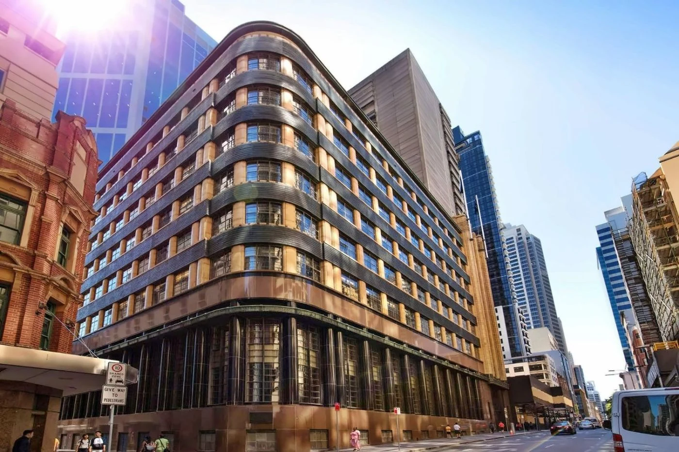 The curved Art Deco facade of Kimpton Margot Sydney on Pitt Street