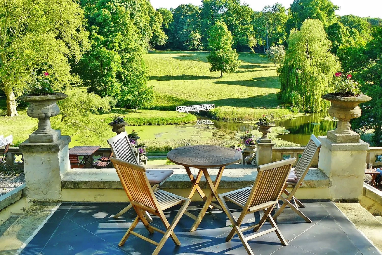 Quiet garden terrace with a table and two chairs