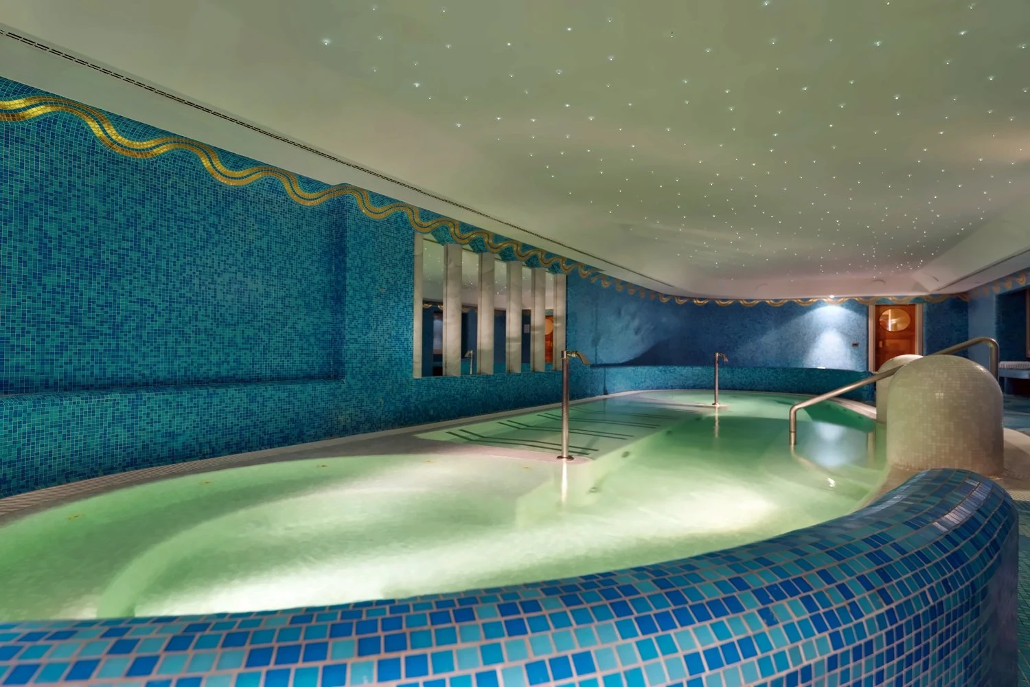 Blue mosaic hydropool at Hotel de Russie in Rome