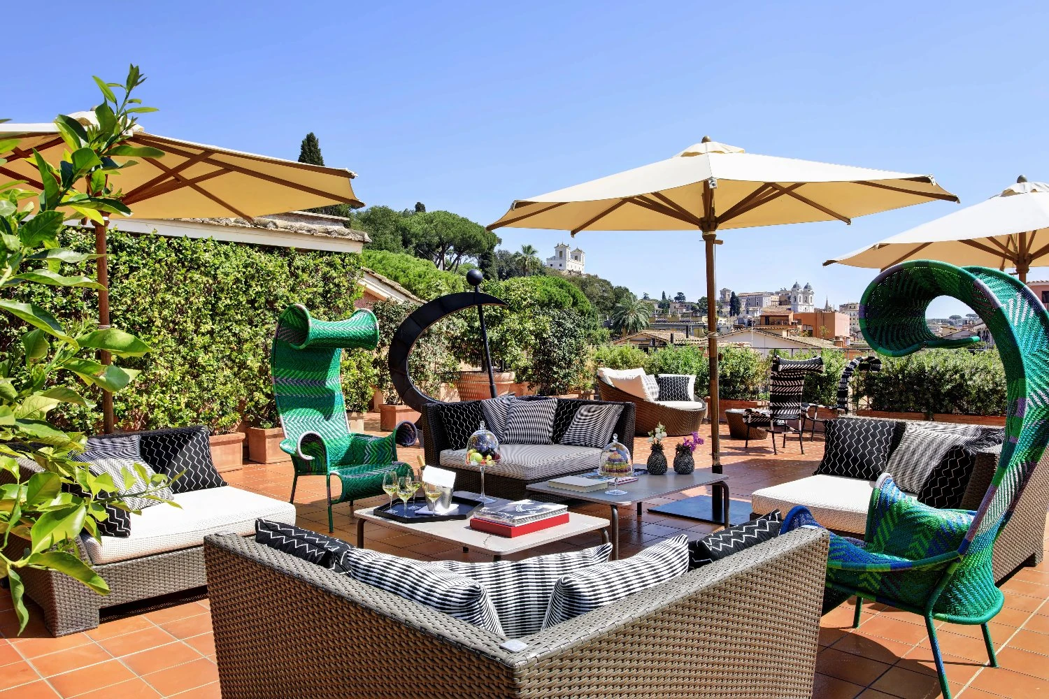 Garden terrace seating at Hotel de Russie