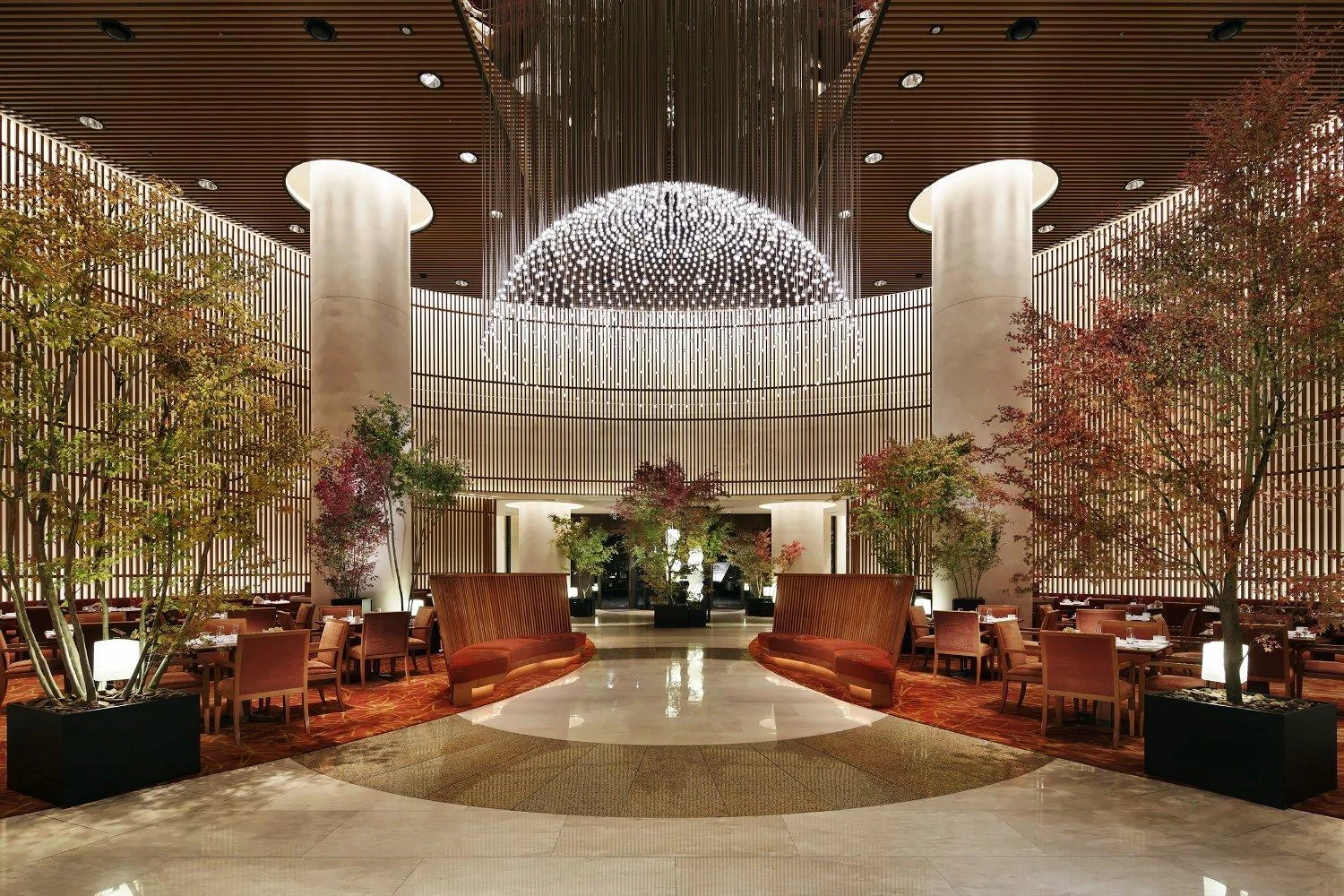 The Peninsula Tokyo lobby beneath a sculptural chandelier