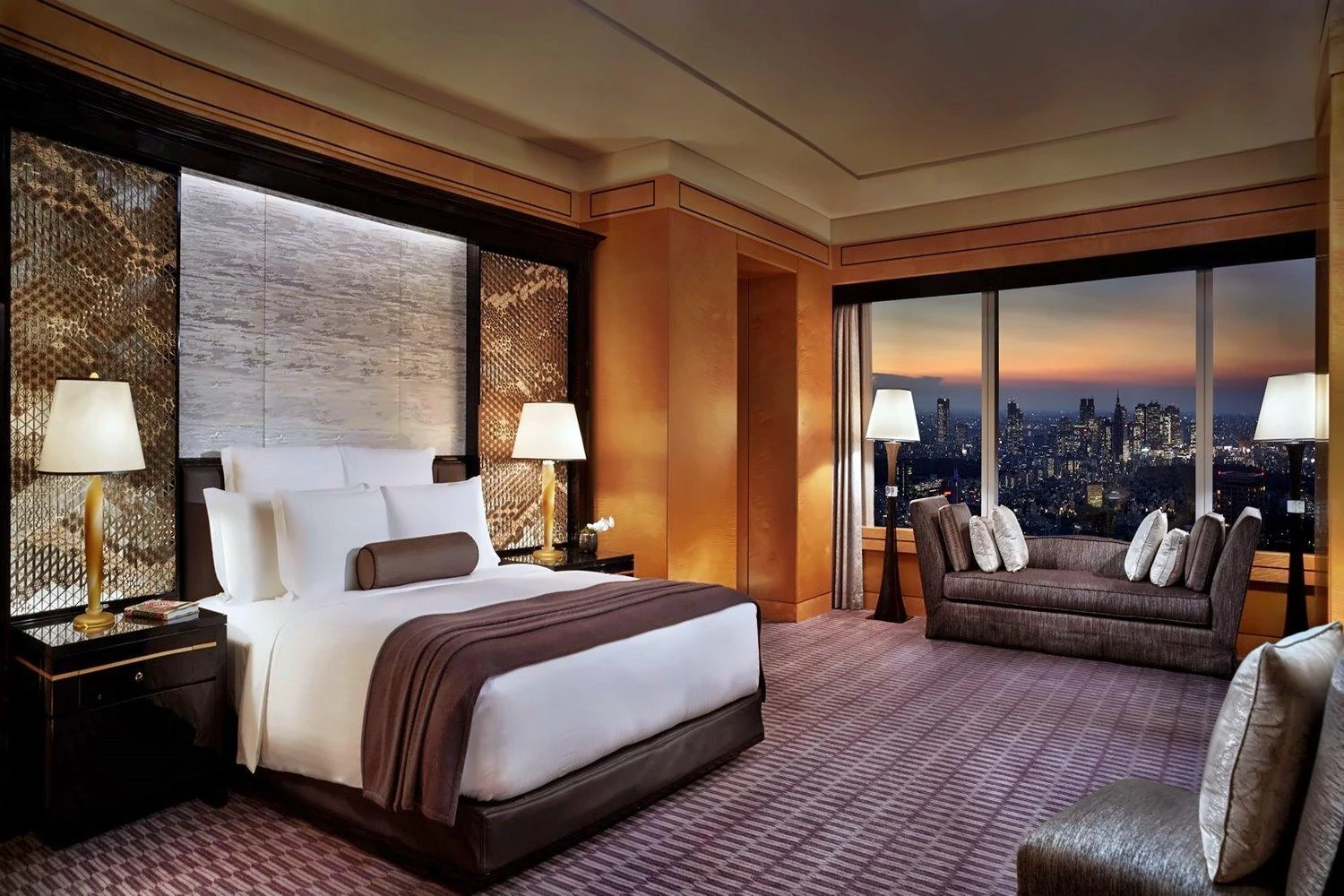 Bedroom and skyline view at The Ritz-Carlton, Tokyo