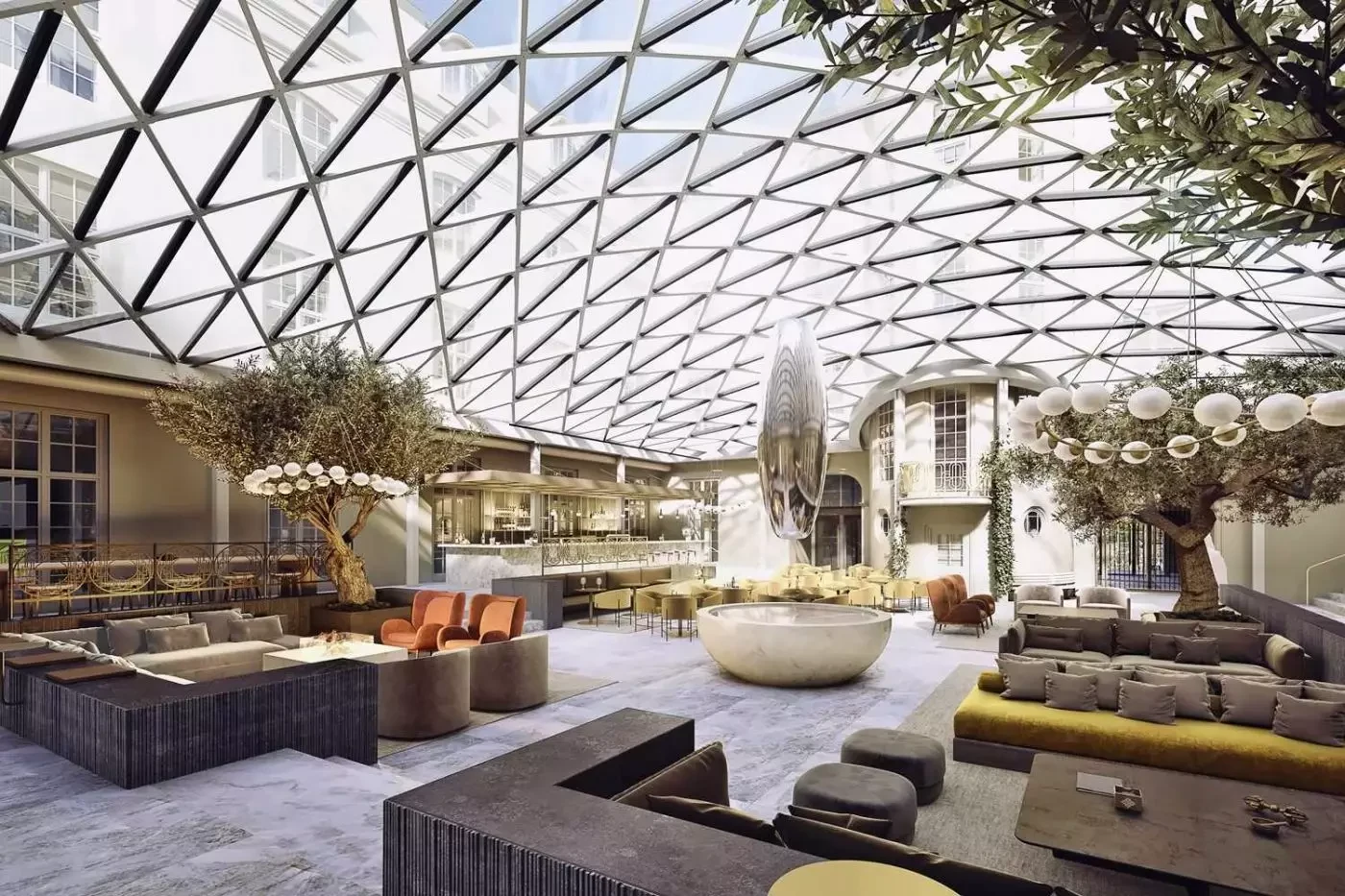 Glass-covered courtyard and lounge seating at Villa Copenhagen